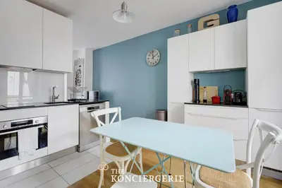 Cuisine ou kitchenette dans l'établissement Duplex Cosy 3 pieces 14e