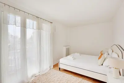 Un ou plusieurs lits dans un hébergement de l'établissement PARIS 10 - Luxury flat L024