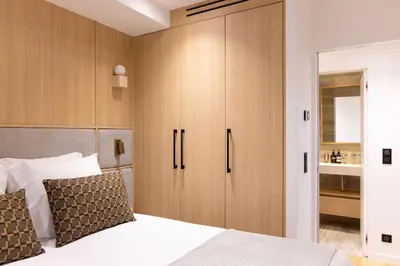 Un ou plusieurs lits dans un hébergement de l'établissement Elegant apartment with AC - 3BR-6P- Montorgueil