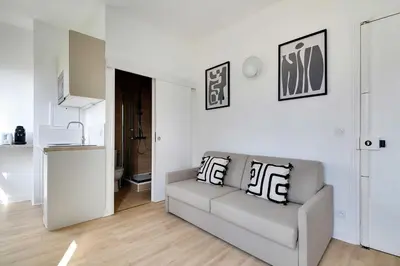 Coin salon dans l'établissement Cosy studio for 2 people - Malakoff