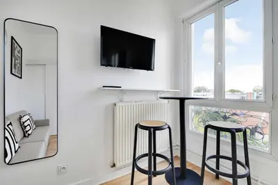 Télévision ou salle de divertissement dans l'établissement Cosy studio for 2 people - Malakoff