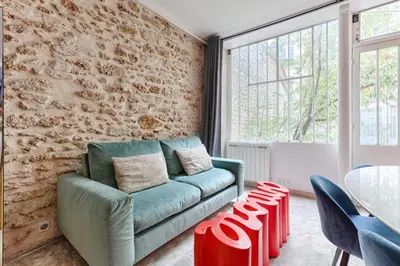 Coin salon dans l'établissement MyKeypers - Authentic Deluxe 2BR Flat - Rue Montorgueil