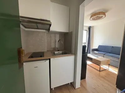 Cuisine ou kitchenette dans l'établissement New Apartment Hotel Palais des Congrès Porte Maillot 31