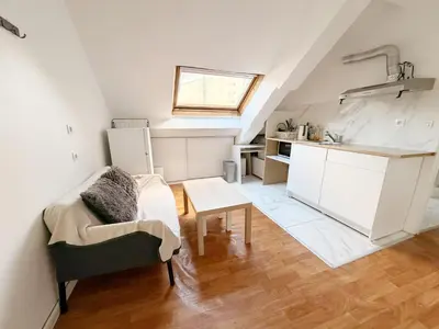 Cuisine ou kitchenette dans l'établissement Cozy Apartment The Pompidou