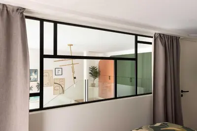Un ou plusieurs lits dans un hébergement de l'établissement Bright Loft - 2BR 6P - close to Montmartre