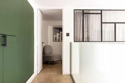 Un ou plusieurs lits dans un hébergement de l'établissement Bright Loft - 2BR 6P - close to Montmartre
