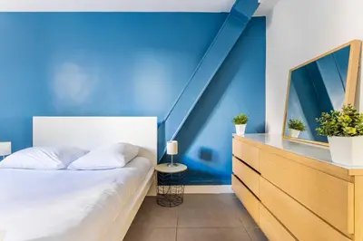 Un ou plusieurs lits dans un hébergement de l'établissement Charming Apartment - 2BR 6P - Bastille