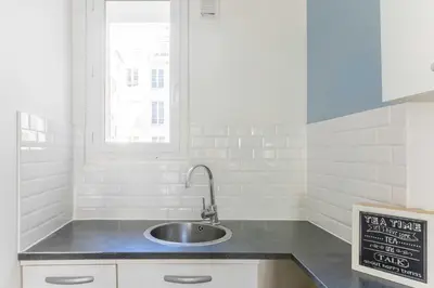 Cuisine ou kitchenette dans l'établissement Charming Apartment - 2BR 6P - Bastille
