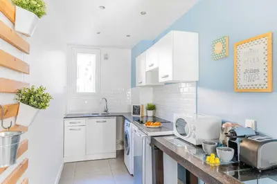 Cuisine ou kitchenette dans l'établissement Charming Apartment - 2BR 6P - Bastille