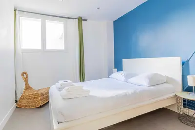 Un ou plusieurs lits dans un hébergement de l'établissement Charming Apartment - 2BR 6P - Bastille