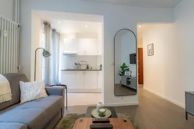 Coin salon dans l'établissement Stylish one bedroom apartment in Paris 17th