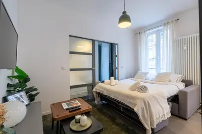 Un ou plusieurs lits dans un hébergement de l'établissement Stylish one bedroom apartment in Paris 17th