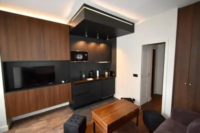 Cuisine ou kitchenette dans l'établissement DoRéMi 4P Paris Gestion Immo Daumesnil