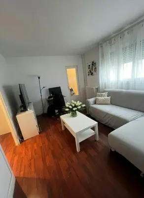 Coin salon dans l'établissement Bel appartement asniere sur seine