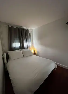 Un ou plusieurs lits dans un hébergement de l'établissement Bel appartement asniere sur seine