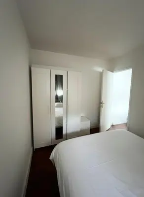 Un ou plusieurs lits dans un hébergement de l'établissement Bel appartement asniere sur seine