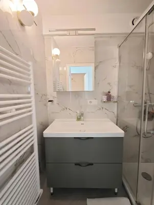 Salle de bains dans l'établissement Arc de Triomphe 2 min walk Elegant Apartment