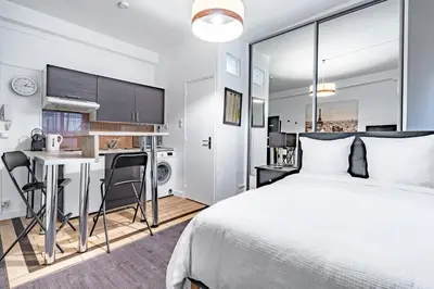 Un ou plusieurs lits dans un hébergement de l'établissement Chic Studio - Rivoli