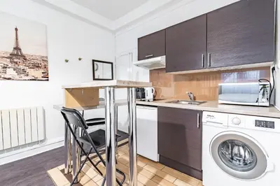 Cuisine ou kitchenette dans l'établissement Chic Studio - Rivoli