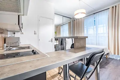Cuisine ou kitchenette dans l'établissement Chic Studio - Rivoli