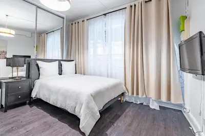 Un ou plusieurs lits dans un hébergement de l'établissement Chic Studio - Rivoli