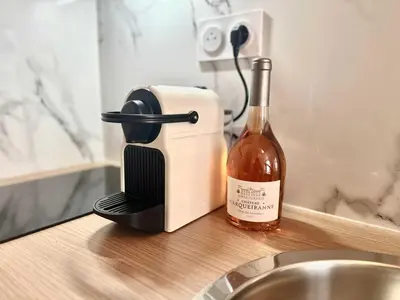 Cuisine ou kitchenette dans l'établissement New 132 Suite Tarantino - Cosy Apartment Paris Center