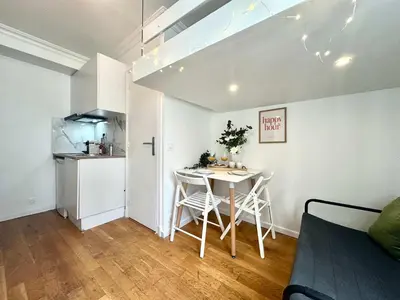 Cuisine ou kitchenette dans l'établissement New 132 Suite Tarantino - Cosy Apartment Paris Center