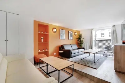 Coin salon dans l'établissement Charmant appartement- 3BR-8P- Opéra