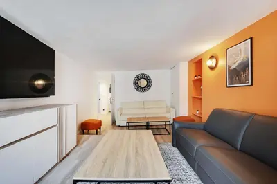 Coin salon dans l'établissement Charmant appartement- 3BR-8P- Opéra
