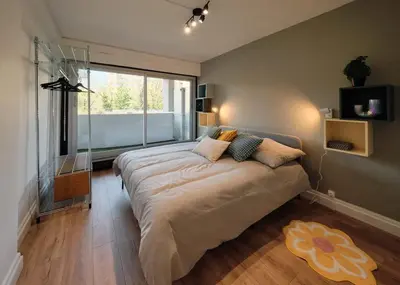 Un ou plusieurs lits dans un hébergement de l'établissement Terrasse, appartement rénové dans le 15e arr