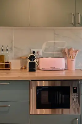 Cuisine ou kitchenette dans l'établissement Terrasse, appartement rénové dans le 15e arr