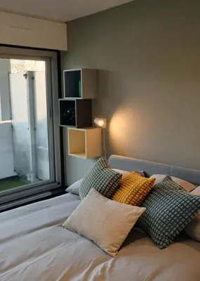 Un ou plusieurs lits dans un hébergement de l'établissement Terrasse, appartement rénové dans le 15e arr