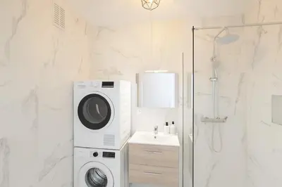 Salle de bains dans l'établissement Appartement Paisible pont de saint cloud - 4P