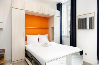 Un ou plusieurs lits dans un hébergement de l'établissement Modern studio next to Roland Garros Stadium