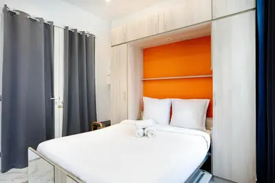 Un ou plusieurs lits dans un hébergement de l'établissement Modern studio next to Roland Garros Stadium