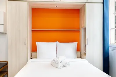 Un ou plusieurs lits dans un hébergement de l'établissement Modern studio next to Roland Garros Stadium