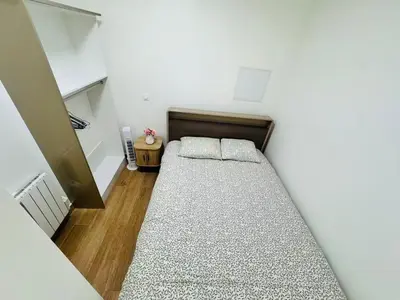 Un ou plusieurs lits dans un hébergement de l'établissement 2-bedrooms apart near the Eiffel Tower