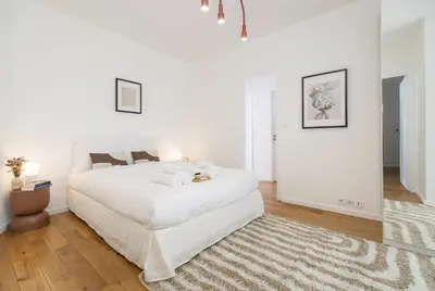 Un ou plusieurs lits dans un hébergement de l'établissement PoeticStay - Champs Elysees