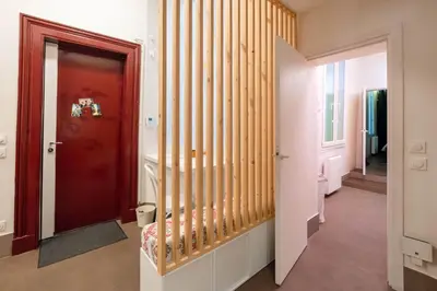 Un ou plusieurs lits dans un hébergement de l'établissement Luxury Flat 2 BDR Design Heart of Marais
