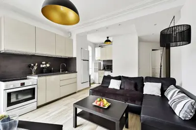Cuisine ou kitchenette dans l'établissement BnBNova - 2BR - Eiffel Tower & Grenelle