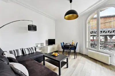 Coin salon dans l'établissement BnBNova - 2BR - Eiffel Tower & Grenelle