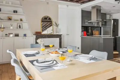 Cuisine ou kitchenette dans l'établissement BnBNova - 2BR - Les Halles & Le Marais