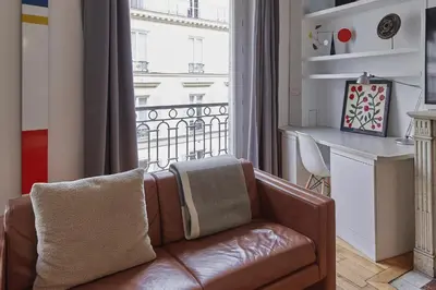 Coin salon dans l'établissement Appartement élégant en plein centre de Paris
