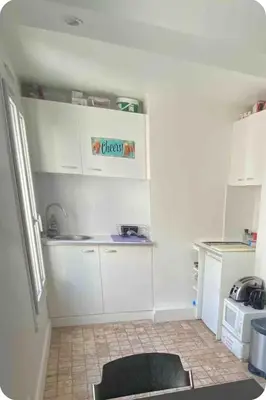 Cuisine ou kitchenette dans l'établissement Montmartre village