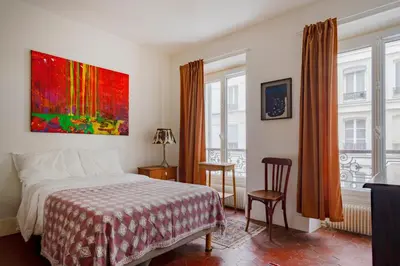Un ou plusieurs lits dans un hébergement de l'établissement Paris Marais Keller residence