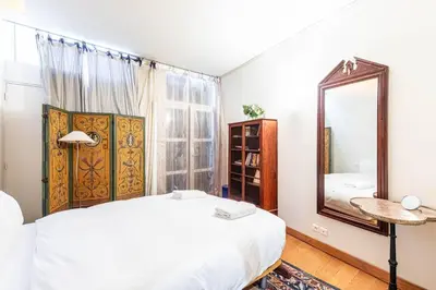 Un ou plusieurs lits dans un hébergement de l'établissement GuestReady - Spacious mid-term apartment for 4