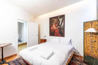 Un ou plusieurs lits dans un hébergement de l'établissement GuestReady - Spacious mid-term apartment for 4