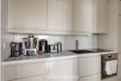 Cuisine ou kitchenette dans l'établissement Appartement de 3 chambres avec Balcon à proximité de l'Arc de triomphe