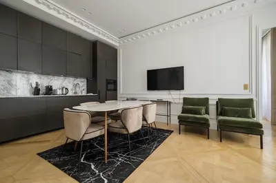Télévision ou salle de divertissement dans l'établissement My Paris Apartments - Marbeuf