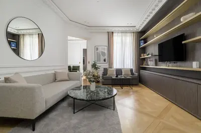 Télévision ou salle de divertissement dans l'établissement My Paris Apartments - Marbeuf